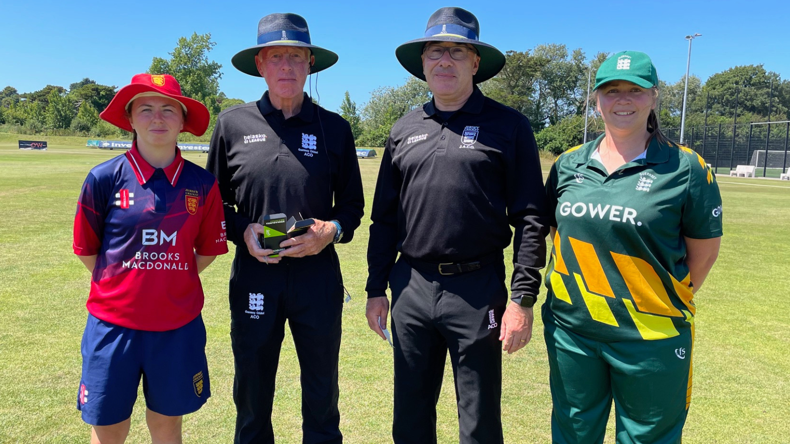 Captains and umpires at the toss at KGV
